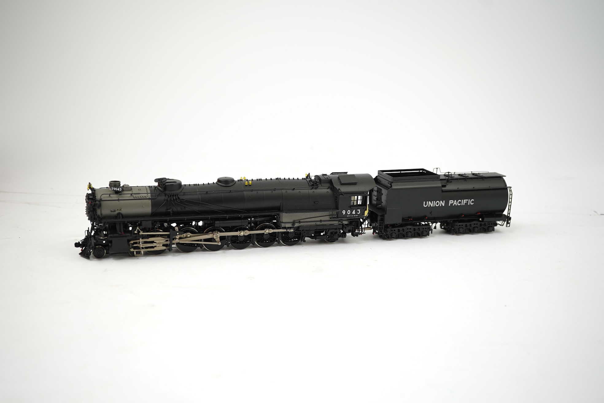 A boxed HO gauge Key Imports model of Union Pacific 9000 class, 9043, 4-12-2 tender locomotive, powered for two rail operation.